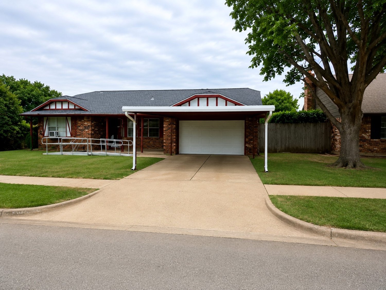 Custom attached steel carport